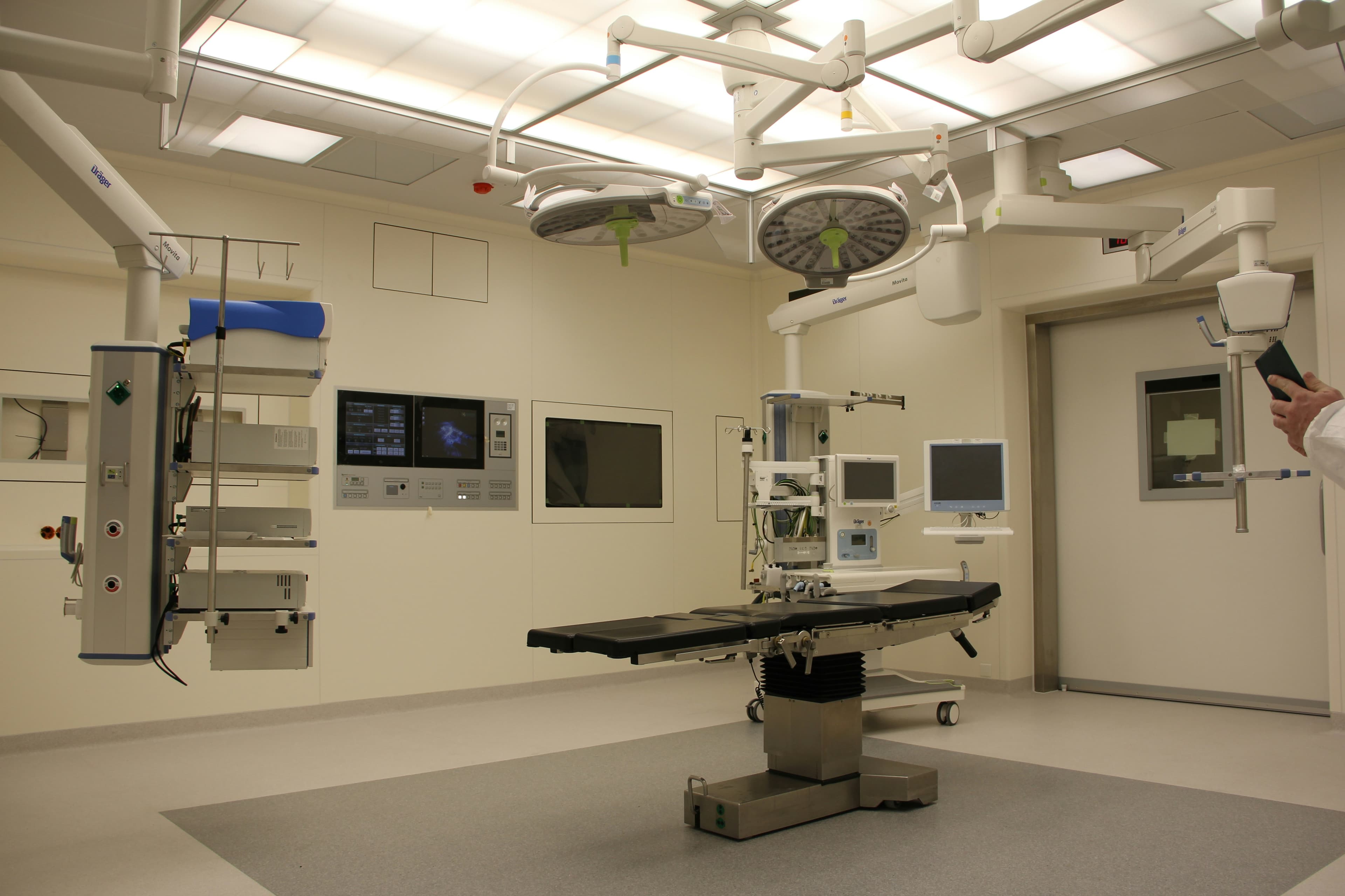 Patient checking in at a serene wellness reception desk with warm ambient lighting